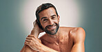 Beauty, happy and skincare with portrait of man in studio for cleaning, salon grooming and dermatology. Self care, cosmetics and aesthetic with person on background for facial and spa treatment