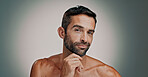 Beauty, glow and skincare with portrait of man in studio for cleaning, salon grooming and dermatology. Self care, cosmetics and aesthetic with person on background for facial and spa treatment