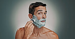 Shaving, cream and grooming with portrait of man in studio for beard, beauty and cleaning. Hair removal foam, cosmetics and self care with person and brush on background for hygiene and skincare