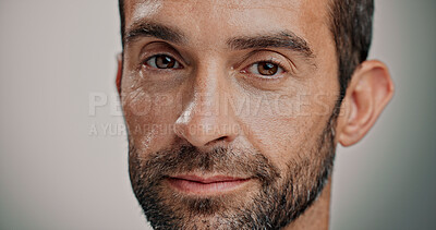 Buy stock photo Portrait, skincare and man in studio for natural beauty, beard and facial treatment isolated on gray background. Face, cosmetics and male model with confidence for dermatology, glow and aesthetic