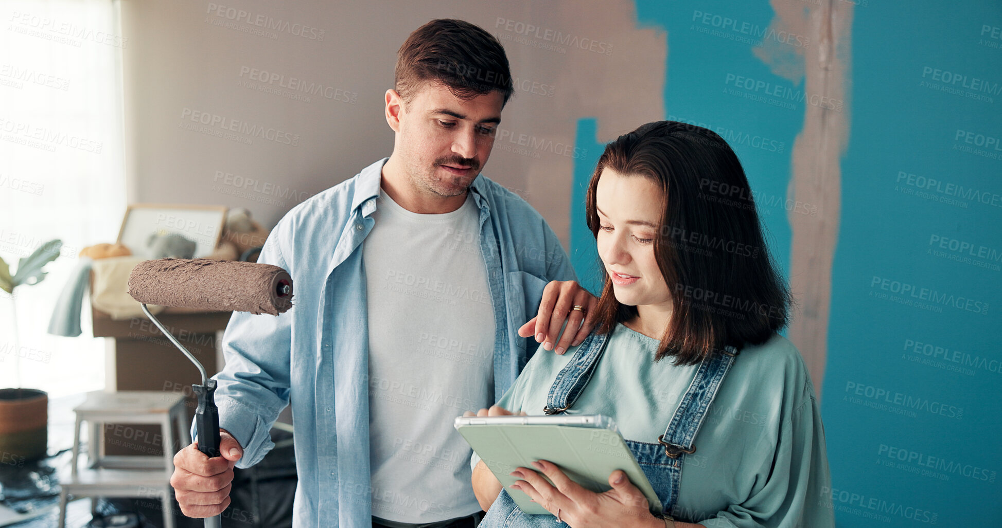 Buy stock photo House, painting and couple with tablet, planning and ideas on social media for new home. Discussion, online search and people with tech for creative, renovation and painter with roller in apartment
