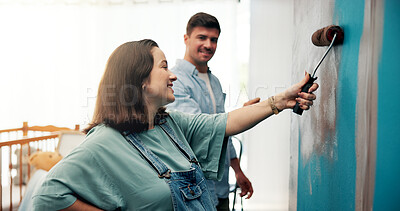 Buy stock photo Couple, excited and painting a wall in home for diy renovation, living room makeover or house improvement. Interior design, people or support for decoration process, conversation or relationship