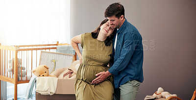 Buy stock photo Pregnancy, couple and touching stomach in home for growth development, connection and maternity support. People, pregnant parents and tummy affection in baby nursery for bonding, wellness and waiting