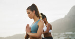 Woman, friends and yoga with namaste in nature, mountains and together with meditation guide in summer. Girl, people and peace with zen, chakra and outdoor with prayer hands mindfulness in morning