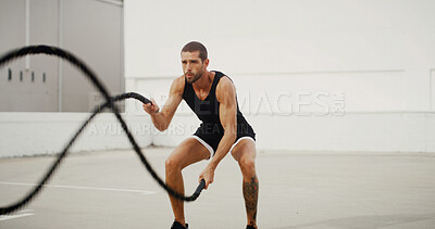 Buy stock photo Workout, man and battle ropes outdoor for core strength, power training and fitness endurance. Space, athlete and energy with exercise equipment for agility, health performance or physical activity