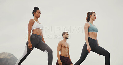 Buy stock photo Group, friends and exercise with lunge in nature with low angle, balance and challenge for fitness. People, together and start workout with warm up, training and stretching for wellness by mountains