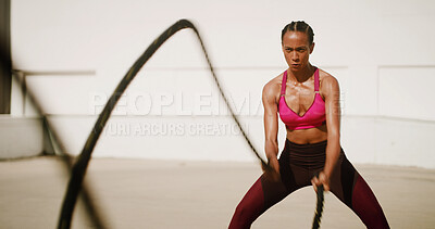 Buy stock photo Fitness, outdoor and woman with battle ropes for intense training, workout or health. Muscle, female bodybuilder and equipment for strength exercise, fast and motion blur for cardio challenge in city