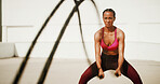 Fitness, workout and woman with battle ropes for intense training, exercise and health. Muscle, female bodybuilder and equipment for strength, fast or motion blur for cardio challenge outdoor in city