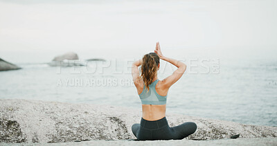 Buy stock photo Ocean, back and meditation for woman, outdoor or spiritual practice for wellness, peace or relax. Sea, chakra and self awareness for person, mindfulness and yoga with benefits, calm or zen with space