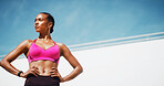 Fitness, woman and confident with break, exercise space and sweat with wellness. Athlete, thinking and blue sky mockup for performance, body goals and serious outdoors for summer sports and balance