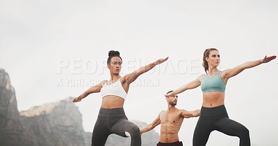 Buy stock photo Yoga, warrior pose and people for workout, balance and health outdoors in morning. Fitness, pilates and man and women for exercise, wellness and stretching for calm, mobility or flexibility in nature