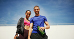Couple, smile and fitness with portrait, outdoor and low angle in summer with water, support and break for wellness. Man, woman and happy together for workout, training or bottle for exercise in city