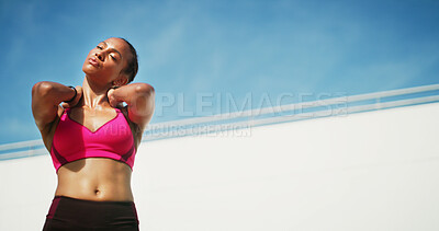 Buy stock photo Fitness, woman and neck stretching with break, exercise space and sweat with wellness. Athlete, warm up and blue sky mockup for performance, body goals and outdoors for summer sports and low angle