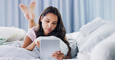 Buy stock photo Relax, reading and tablet with woman in bedroom for online dating, chat forum and social media. Profile view, status update and connection with person at home for networking, communication and search