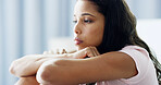 Girl, bedroom and thinking with insomnia, anxiety and reflection with depression at apartment. Woman, person and wake up sad with fatigue, lonely and worry with stress for mental health in house