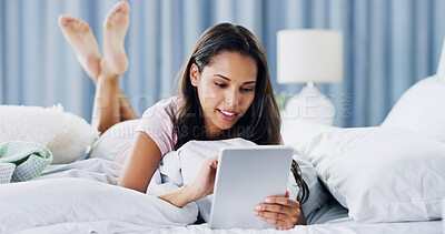 Buy stock photo Relax, smile and tablet with woman in bedroom for online dating, chat forum and social media. Profile view, status update and connection with person at home for networking, communication and search
