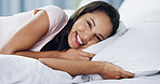 Smile, relax and portrait of woman in bed for leave, holiday or morning with peace and calm. Happy, confident and face of female person from Brazil in bedroom for rest on vacation in rental home.