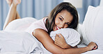 Happy, relax and portrait of woman on bed for calm, mindfulness and peace for vacation at hotel. Smile, rest and female person in bedroom of rental apartment for holiday, getaway or weekend trip.