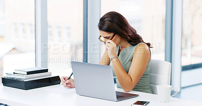 Buy stock photo Writing, employee and woman in office, serious and secretary with notes for schedule, laptop and desk. Corporate, receptionist and person with notebook for project, info and planning for business
