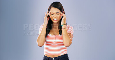 Buy stock photo Woman, headache and frustrated in studio, pain and burnout with mock up space for relief by background. Girl, person and stress for chronic migraine with brain fog, pressure or dizzy with fatigue