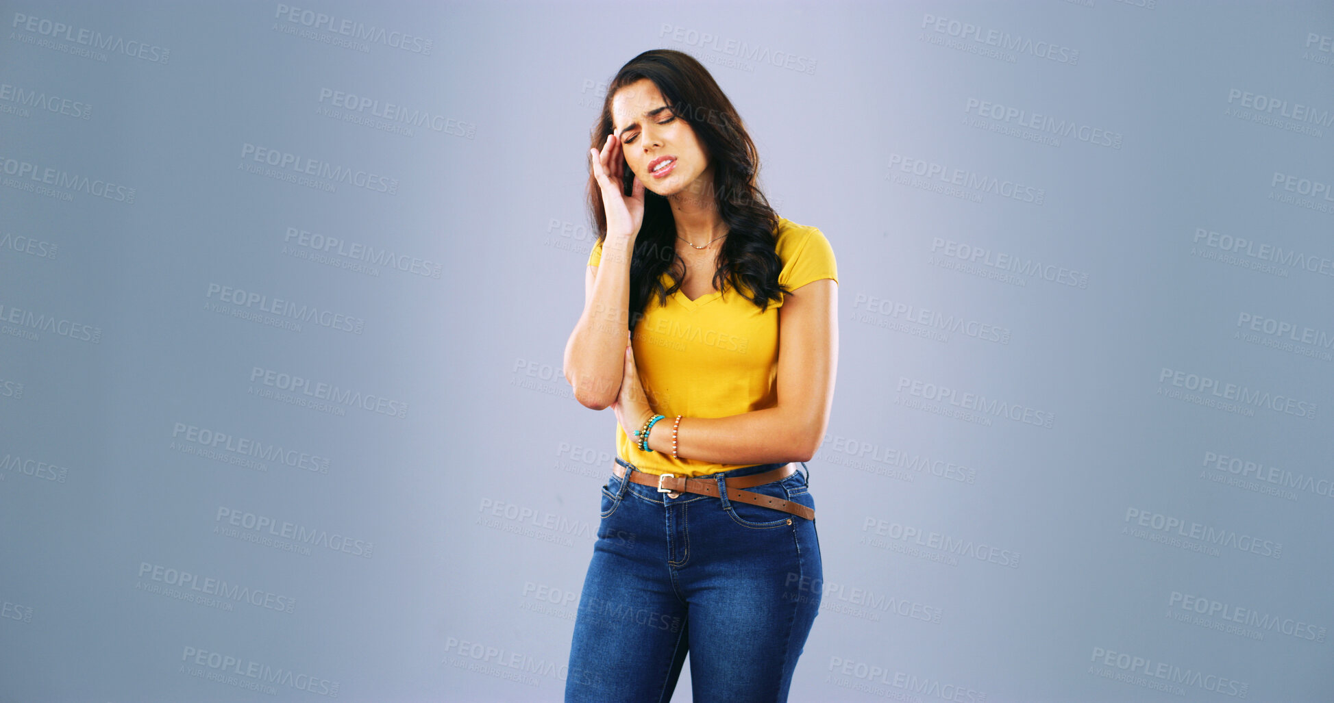 Buy stock photo Headache, stress and woman in studio with anxiety, temple massage and pain on gray background. Burnout, brain fog and girl with migraine, vertigo or dizzy, fatigue or frustrated on mockup space