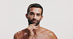 Confident, beauty or portrait of man in studio for skincare glow, grooming mockup and dermatology. Self care cosmetics, male model and person on white background for facial treatment, space or shine