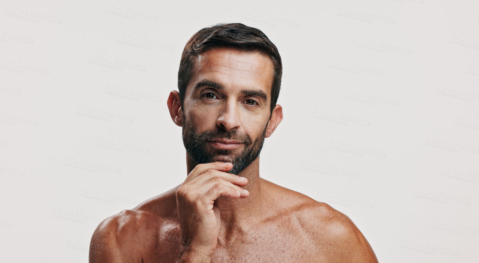 Buy stock photo Confident, beauty or portrait of man in studio for skincare glow, grooming mockup and dermatology. Self care cosmetics, male model and person on white background for facial treatment, space or shine
