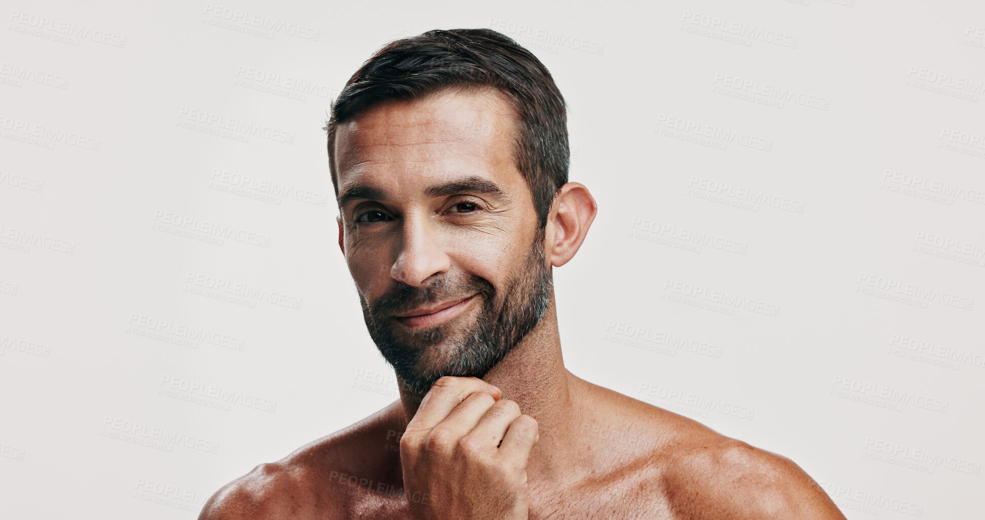 Buy stock photo Confident, skincare or portrait of man in studio for beauty glow, grooming face and dermatology. Self care cosmetics, male model and proud person on white background for facial treatment or wellness