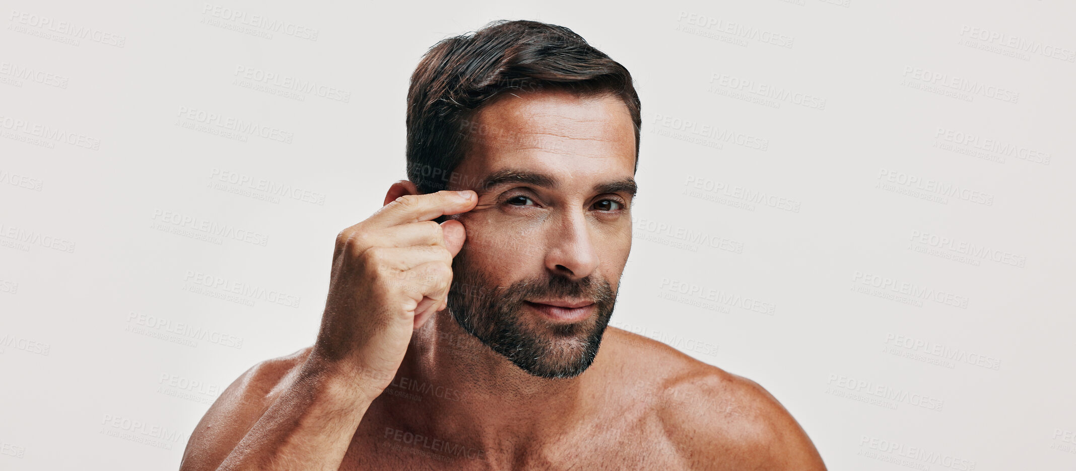 Buy stock photo Check, wrinkles or portrait of man in studio for skincare glow, face beauty or dermatology. Antiaging cosmetics, mockup space or model on white background for facial treatment, banner or inspection