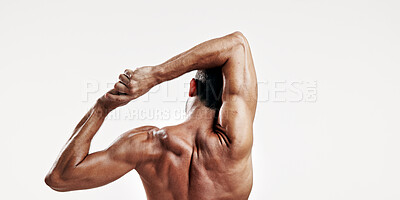 Buy stock photo Fitness, back and man with stretching in studio for muscle wellness, body care and sports exercise on mockup space. Athlete, arm warm up and training for performance and workout on white background