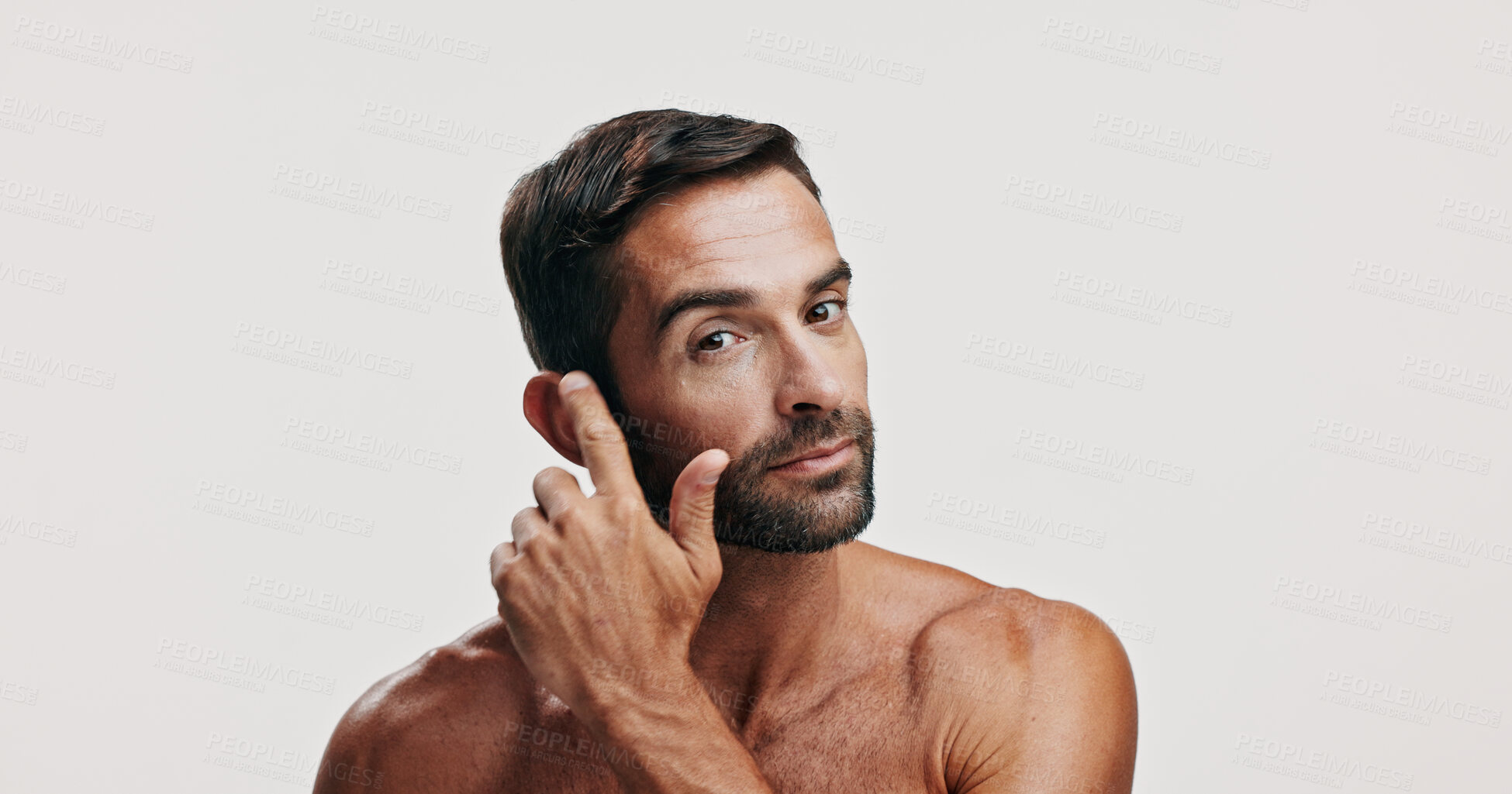Buy stock photo Check, skincare or portrait of man in studio for beauty glow, grooming face and dermatology. Collagen cosmetics, mockup space or person on white background for facial treatment, texture or inspection