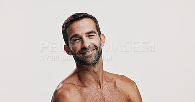 Buy stock photo Confidence, skincare space or portrait of man in studio for beauty glow, grooming face and dermatology. Collagen cosmetics, mockup and person on white background for facial treatment or satisfaction