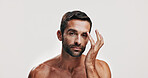 Cleaning, skincare or portrait of man in studio for beauty glow, grooming face or dermatology. Hygiene cosmetics, mockup space or confident person on white background for facial treatment or eyebrows