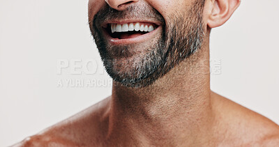 Buy stock photo Happy, teeth and beard of man in studio for wellness, health and cosmetics for grooming. Dermatology, skincare and face closeup of person for hygiene, facial care and dental smile on white background