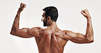 Muscles, flexing and back of man in studio with body building workout for fitness progress. Motivation, biceps and male person with strong arms for power training or exercise by white background.
