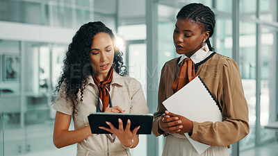 Buy stock photo Collaboration, meeting and tablet with business women in lobby of office for planning or strategy. File, finance and negotiation with employee team in workplace for discussion, feedback or review