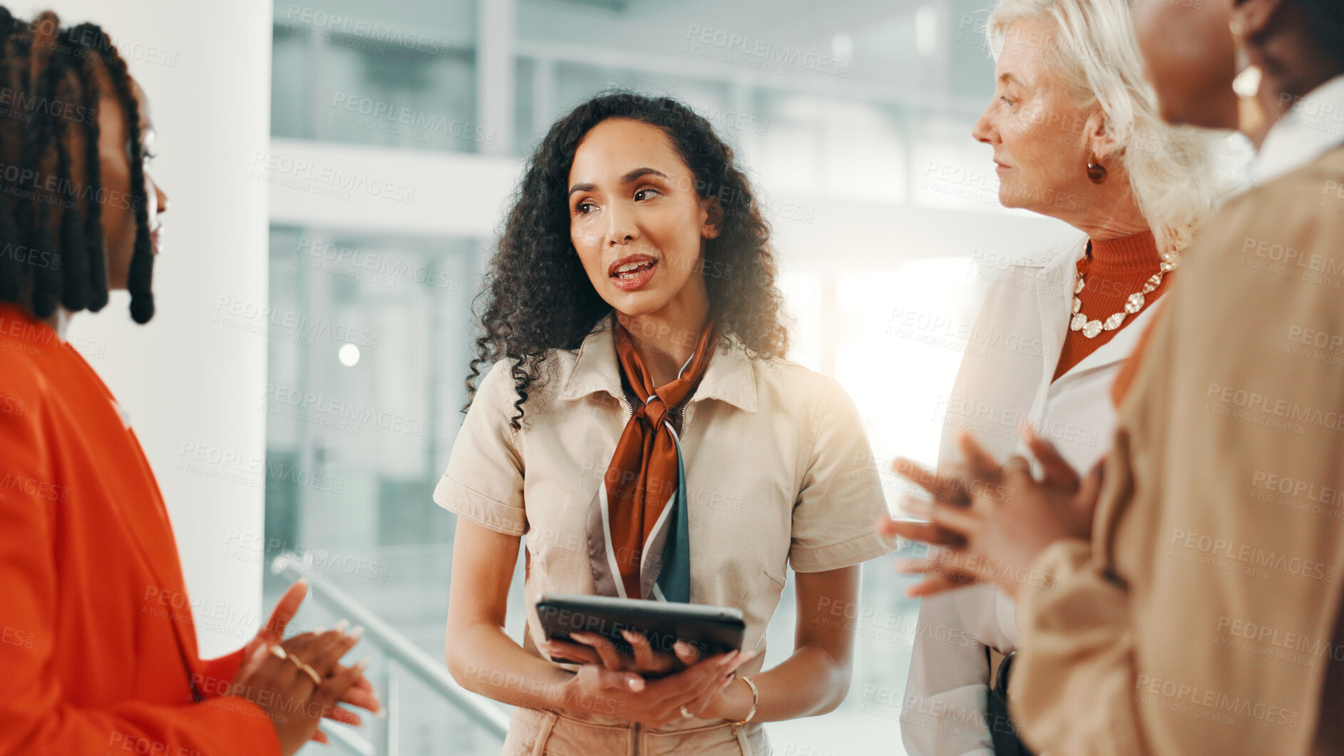 Buy stock photo Explain, meeting and tablet with business women in lobby of office for discussion, planning or strategy. Collaboration, feedback and query with employee team in workplace for answers or review