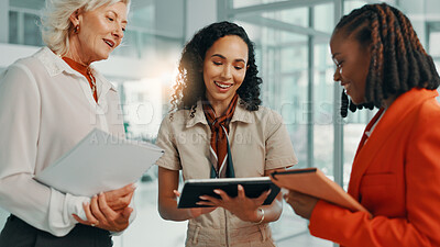 Buy stock photo Documents, smile and tablet with business women in lobby of office for planning or strategy. Collaboration, proposal or report with boss and happy employee team in workplace for feedback or review