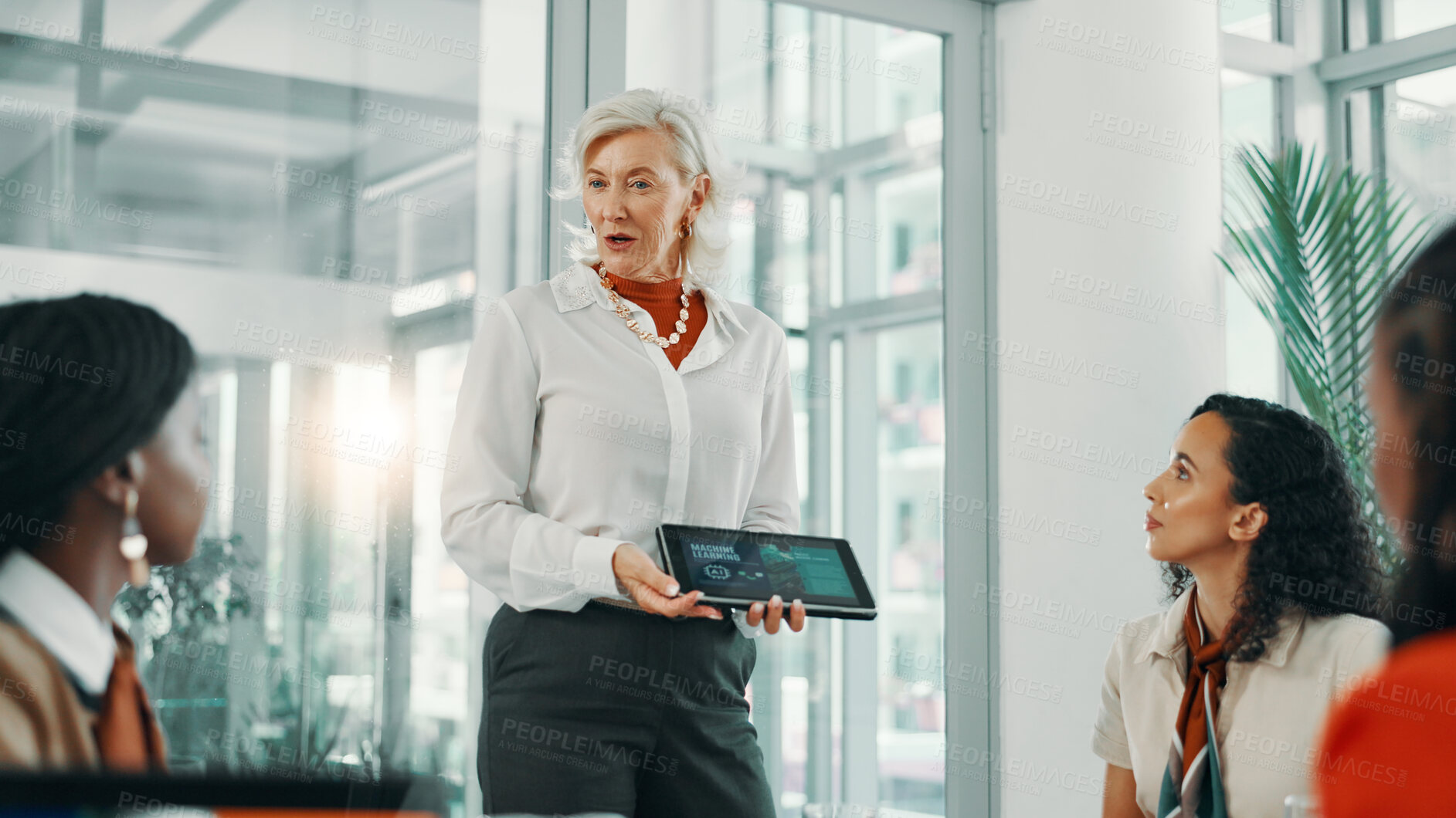 Buy stock photo Presentation, colleagues and women with tablet, business and robotic process automation or screen. Boardroom, machine learning and meeting for current trends on tech, talking and update of AI system