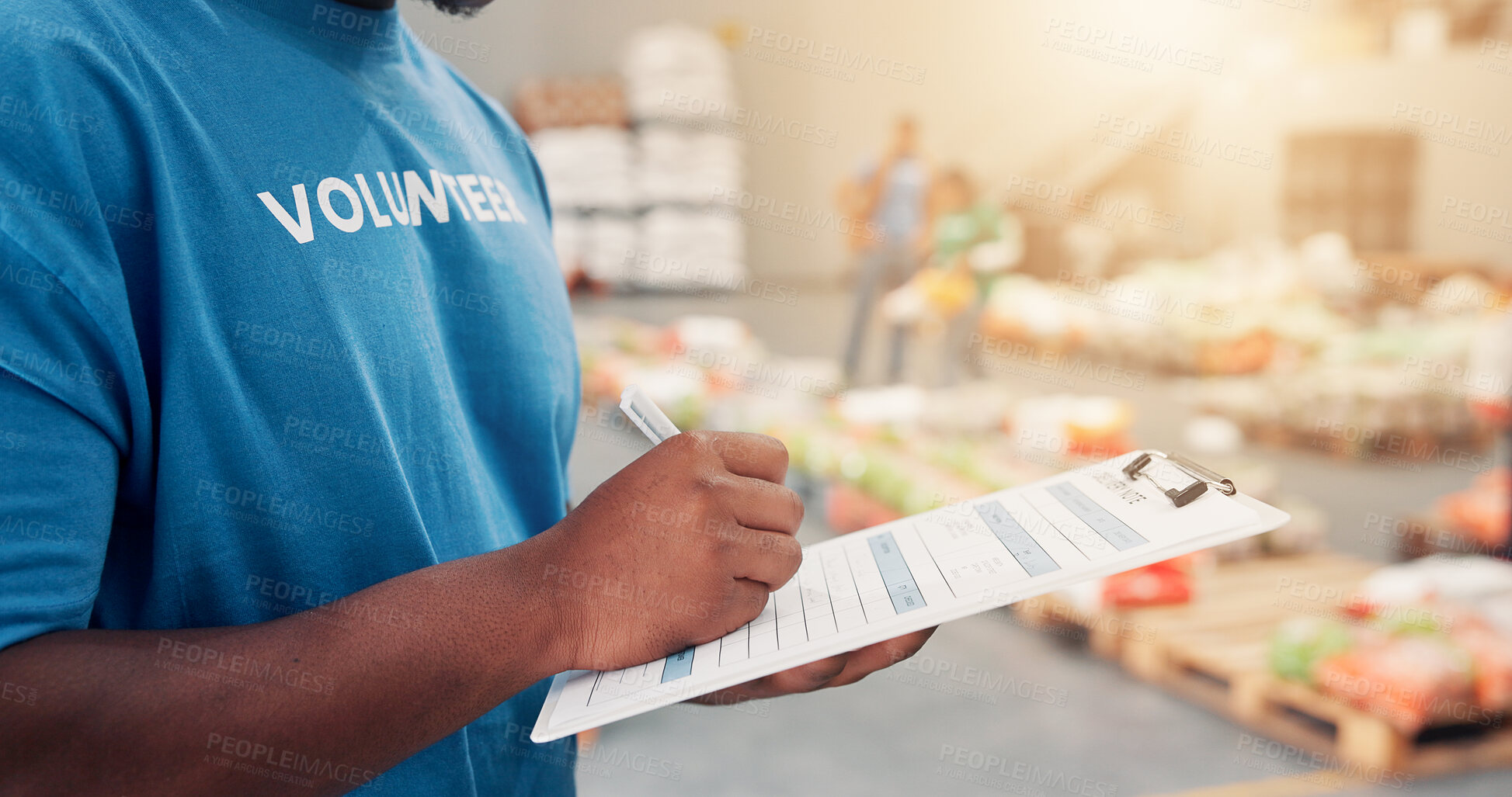 Buy stock photo Clipboard, pen and hands of volunteer writing for charity, non profit or donation stock list in community center. Inspection, notes and male NGO worker with inventory for food drive with information.