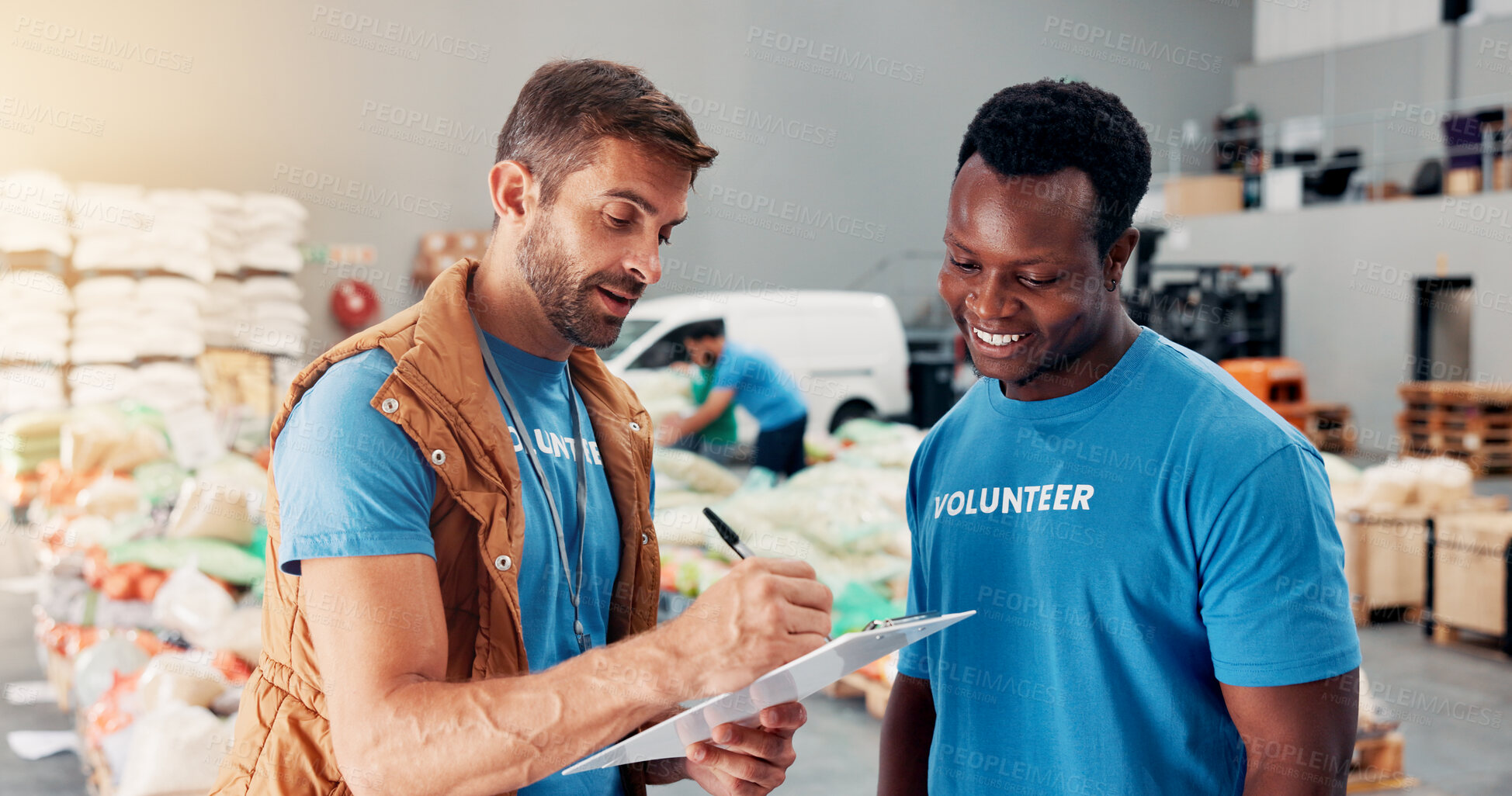 Buy stock photo Men, volunteer and writing on clipboard at warehouse of donation stock, inventory checklist and charity. People, team and grocery notes for humanitarian aid, ngo welfare and food list of distribution