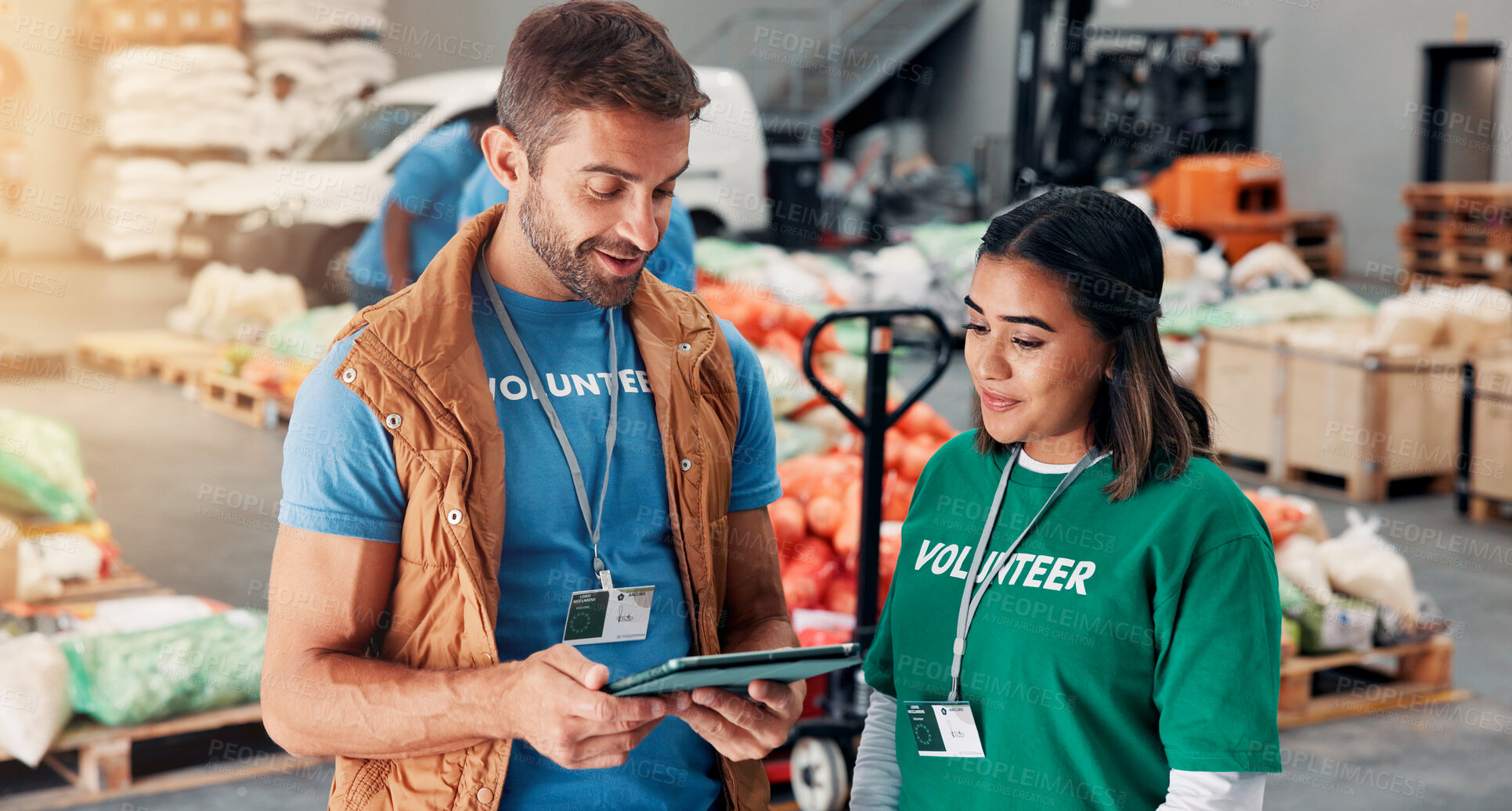 Buy stock photo Volunteer, team and tablet with people in warehouse for non profit, inventory checklist and donation. Charity, social responsibility and food bank program with man and woman in factory for ngo plan
