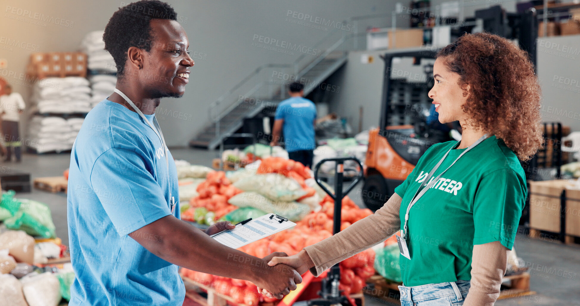 Buy stock photo Shaking hands, welcome and volunteers for donation at food drive, charity or non profit organization. Activism, client and NGO worker with vendor for partnership handshake in community center.
