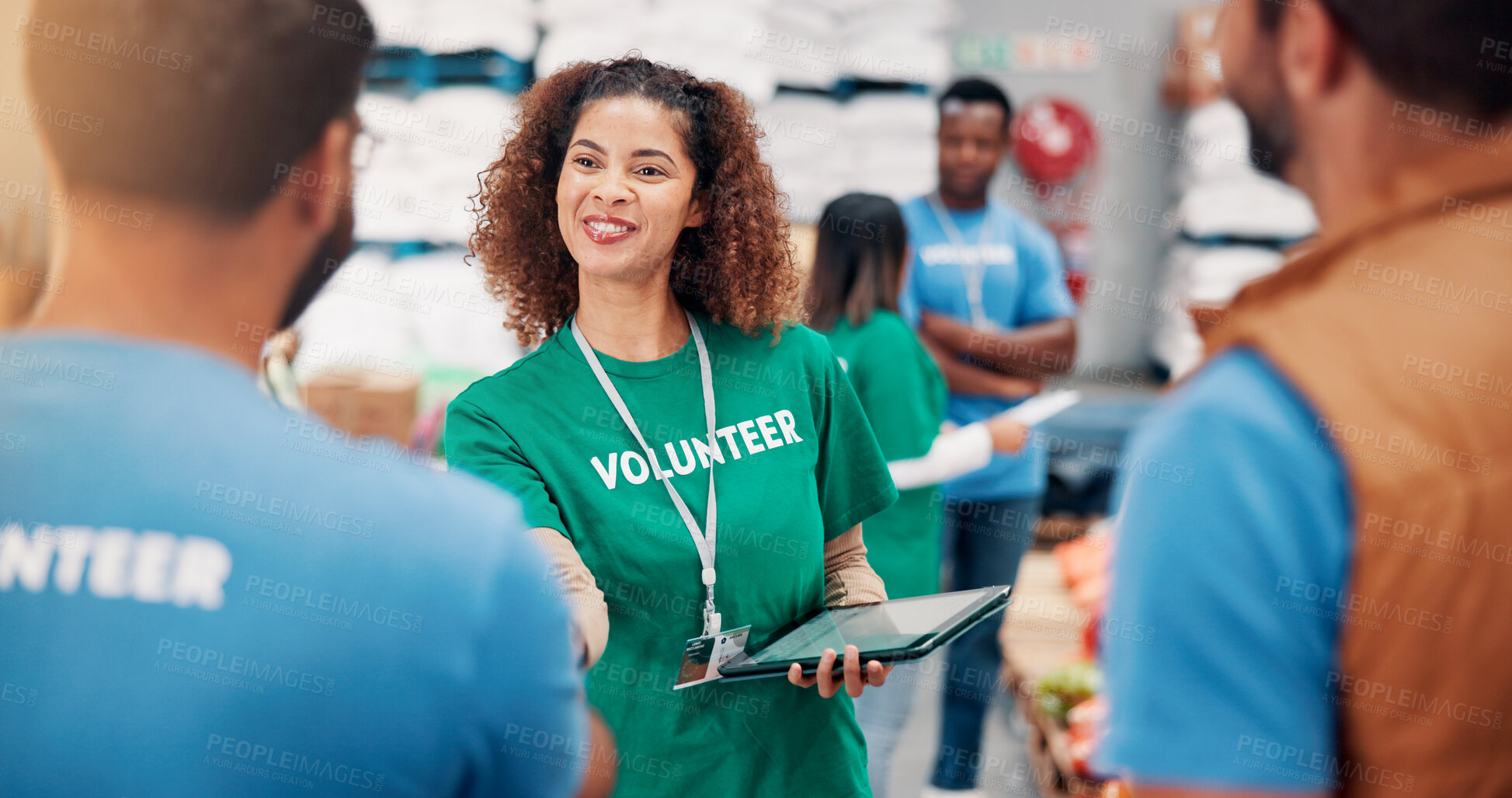 Buy stock photo Smile, people and volunteer on tablet at warehouse for greeting, donation sign up and charity help. Person, b2b introduction and registration of humanitarian aid, community service and ngo onboarding
