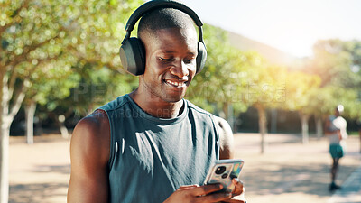Buy stock photo Nature, happy man and music with smartphone for fitness, podcast and confidence with audio track. Outdoor, male person and runner with headphones to listen, radio and mobile with hip hop for exercise