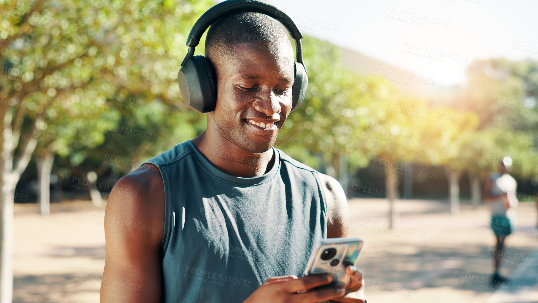Buy stock photo Nature, happy man and music with smartphone for fitness, podcast and confidence with audio track. Outdoor, male person and runner with headphones to listen, radio and mobile with hip hop for exercise