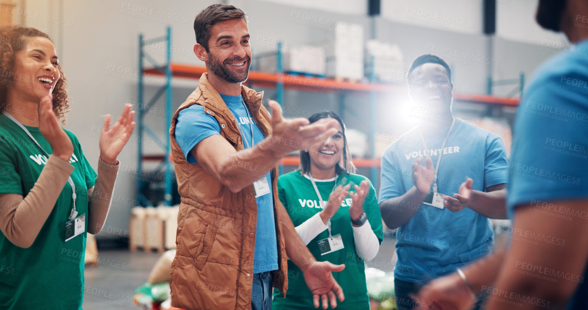 Buy stock photo Smile, people and volunteer for applause of teamwork, introduction or good news for donation winner. Staff, clapping and celebration at charity event, aid promotion and achievement in welfare funding