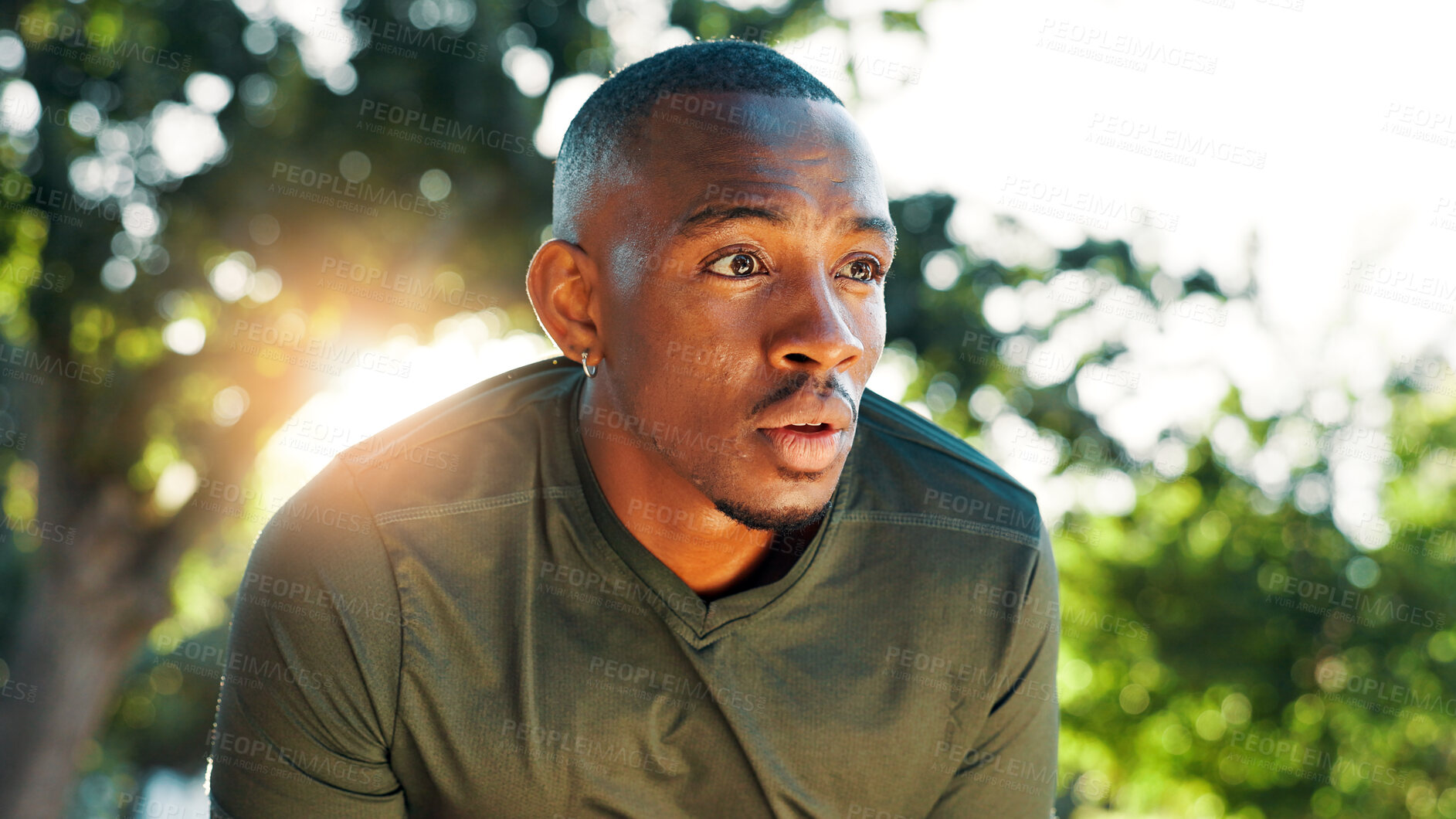 Buy stock photo Exercise, running and tired with black man outdoor for break or rest from cardio training and workout. Breathing, fatigue and fitness with athlete or runner in park for challenge or performance