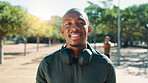 Outdoor, man and smile in portrait for fitness, running marathon and confidence for exercise break. Nature, male person and athlete with happiness for cardio, wellness and workout progress for runner