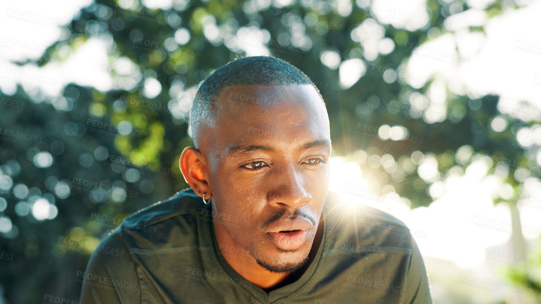 Buy stock photo Fitness, running and tired with black man outdoor for break or rest from cardio training and workout. Breathing, exercise and intensity with athlete or runner in park for challenge or performance